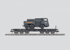 Märklin 4866 H0 Schwerlast-Flachwagen SSym DR Ep. II beladen mit Kaelble